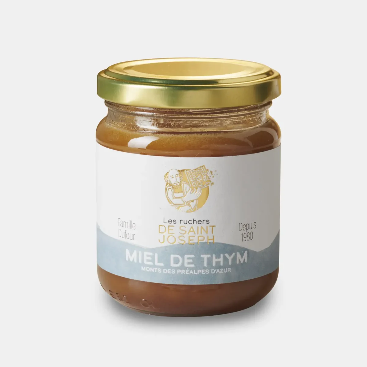 Petit pot de 250g de miel de thym artisanal des Monts des Préalpes d'Azur. Les Ruchers de Saint Joseph.